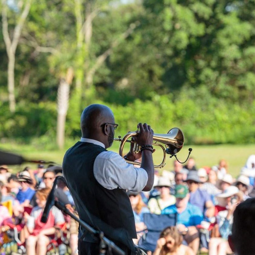 Charlton Singleton plays the trumpet to a crowd at the Charleston Jazz Festival at Firefly Distillery.