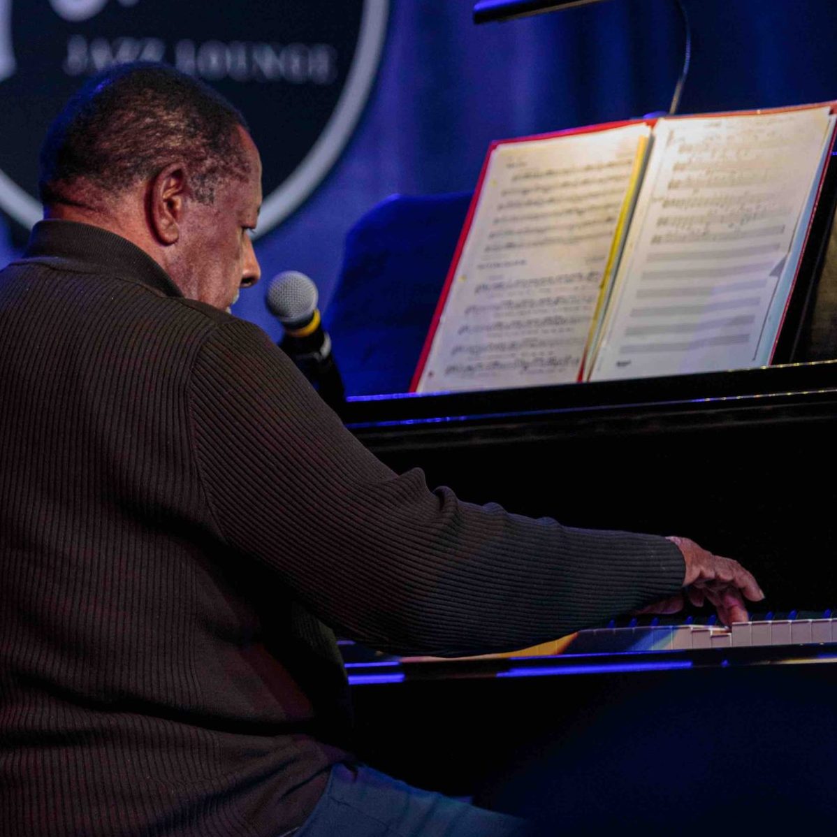 Oscar Rivers playing piano in the Charleston Jazz Festival