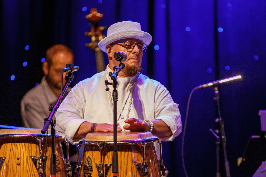 Gino Castillo playing drums with Charleston Jazz Orchestra