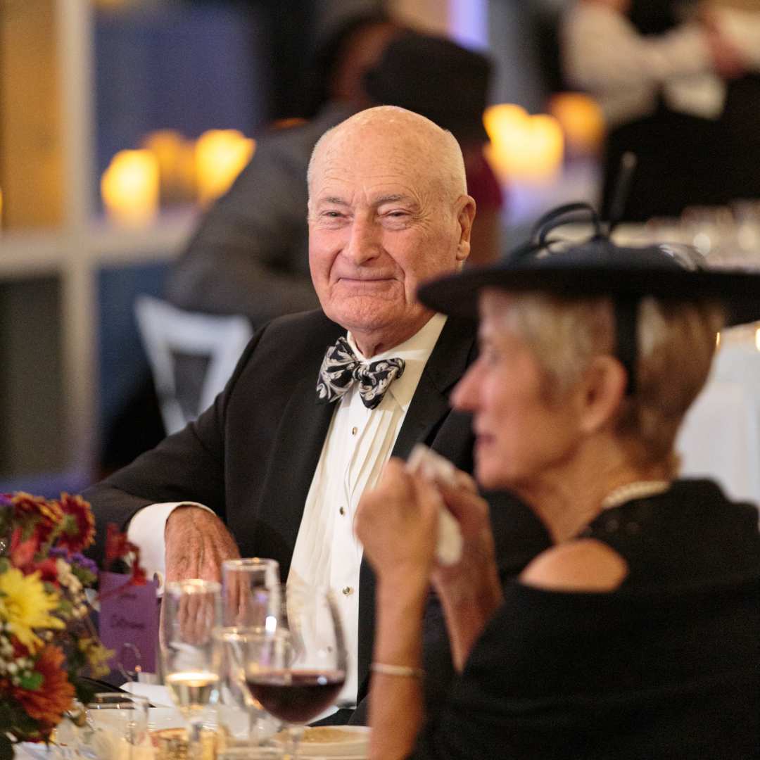 Couple sitting at table at a gala